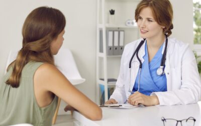 bigstock-Doctor-Pediatrician-Talking-To-460473797