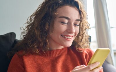 bigstock-Smiling-Young-Woman-Sitting-On-465879887