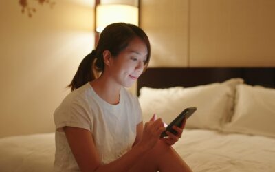 bigstock-Women-uses-a-mobile-phone-and-402056414-scaled